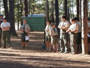 Boy Scout Troop 244 of Laveen present the flag ceremony at Camp Raymond in July 2017.