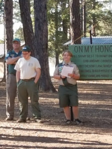 Scouts from Laveen-based Troop 244 practice for a flag ceremony at BSA Camp Raymond in Parks, AZ.