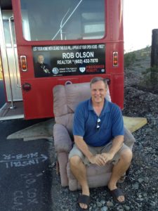 Realtor Rob Olson takes a seat in the Laveen Chair!